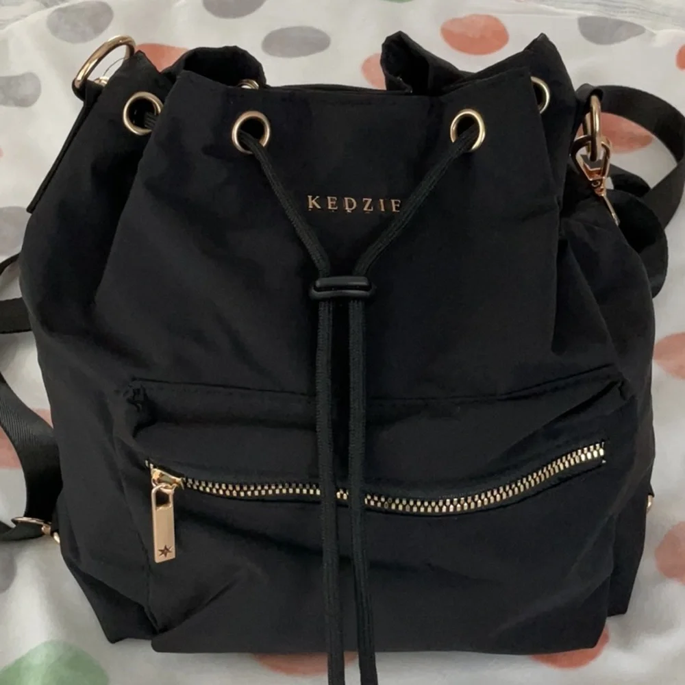 Kenzie black and gold purse - can be worn 3 ways! NWOT!
